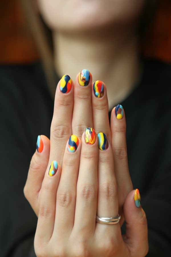 Colorful nail art on short nails