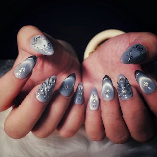 Dark Halloween nail art with silver details